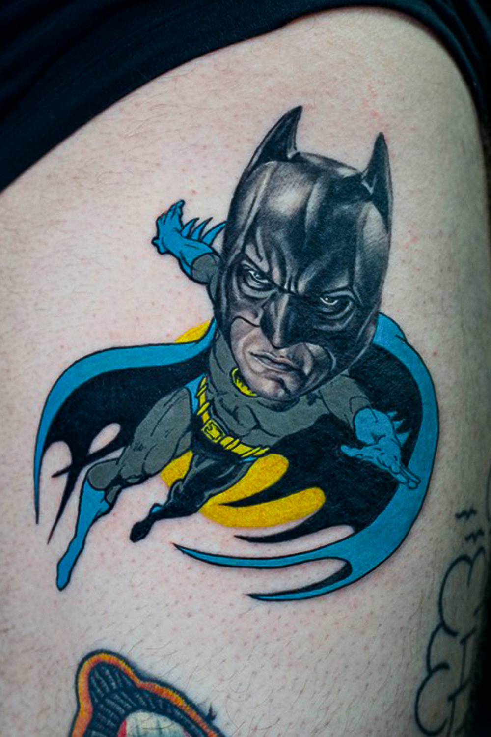 Bat-man Mash-up style tattoo on the leg