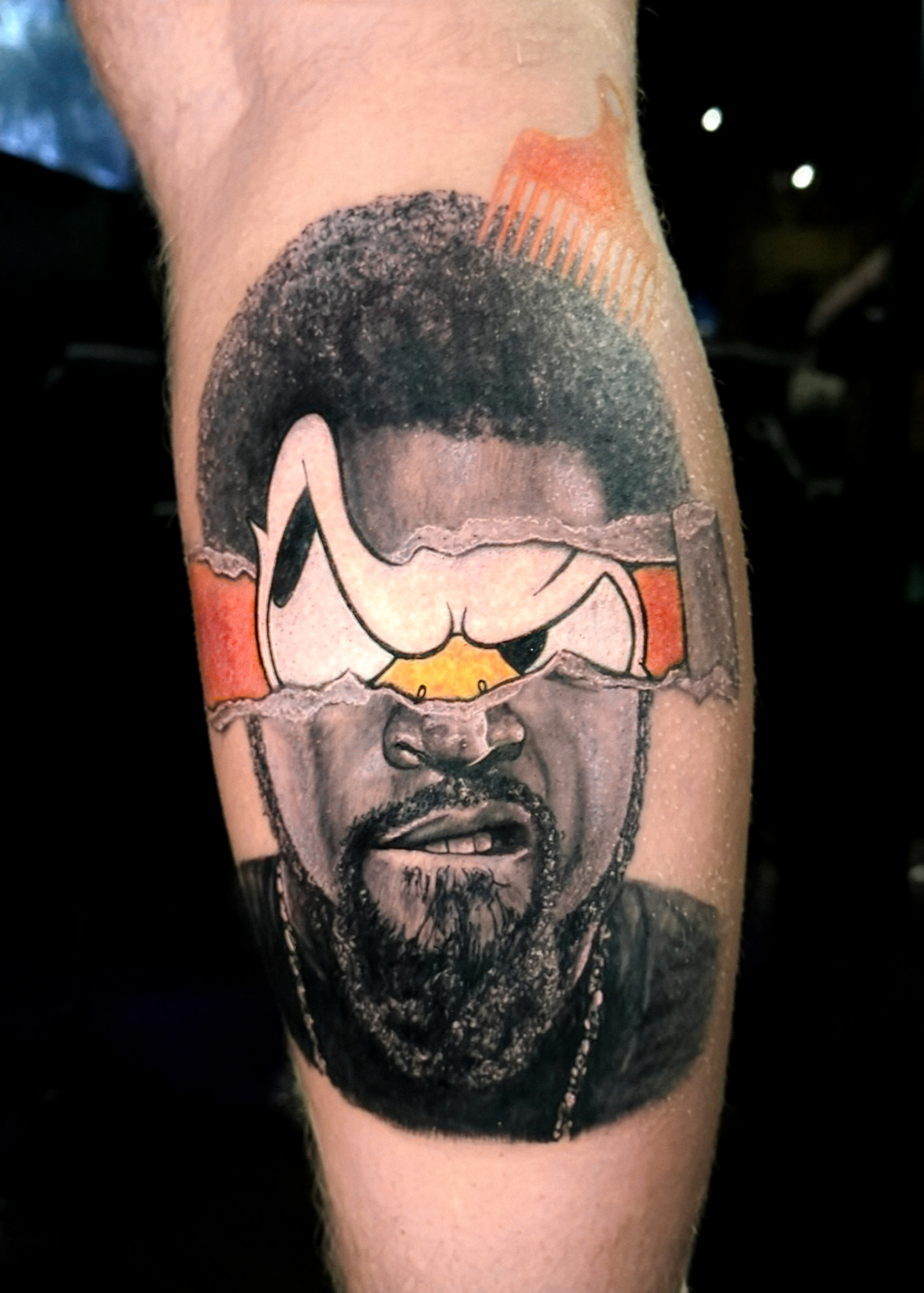 Ice Cube/Donald Duck Mash-up Tattoo