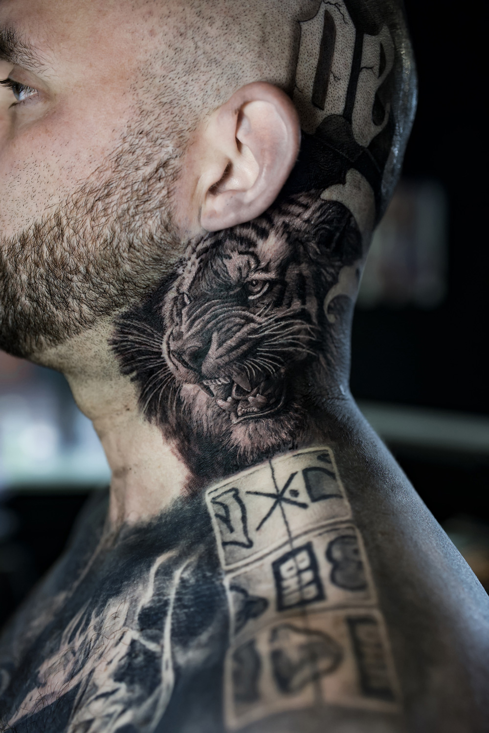 Tiger neck tattoo